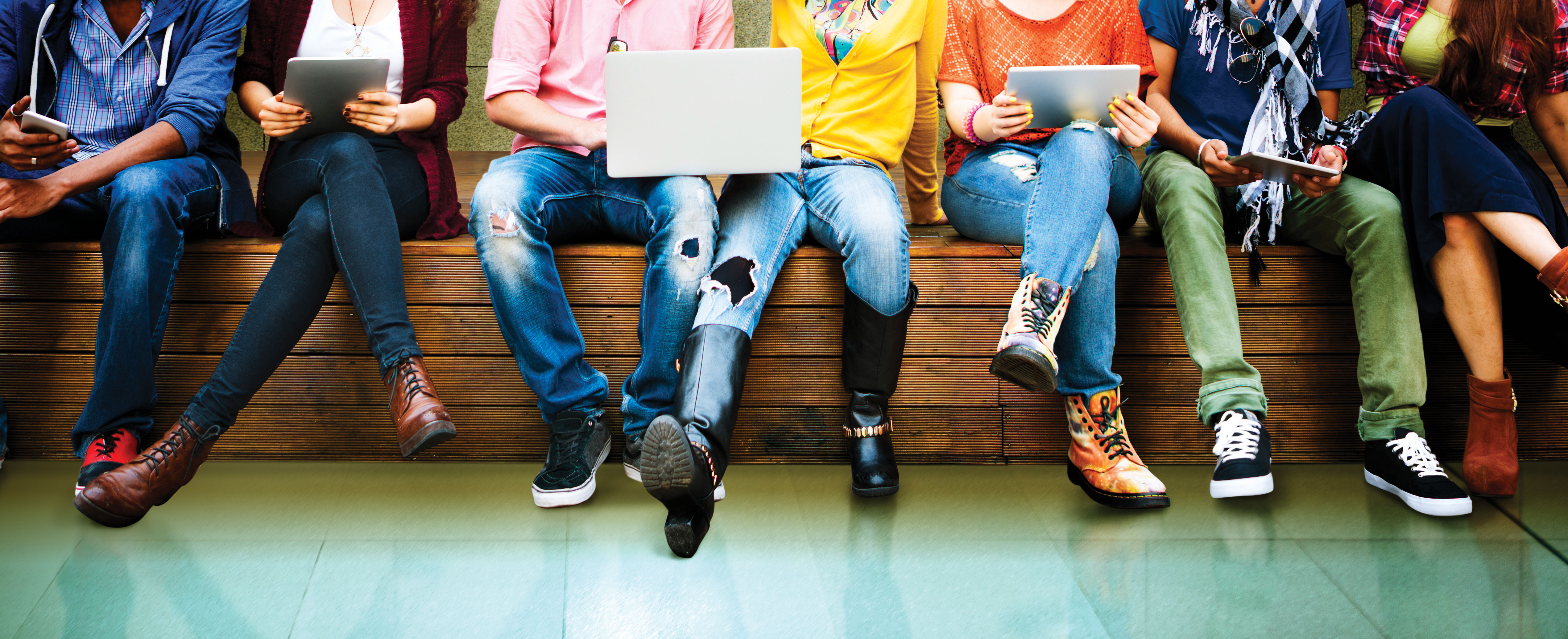 students sitting on a bench
