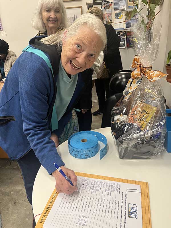 Lady participating in sielent bid