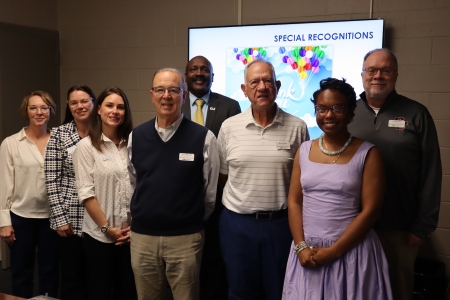 Former board members recognized during the last board meeting (names included in photo caption)